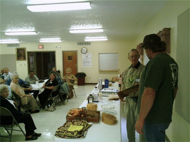 Many donated items were auctioned off. Dr. Anderson of Bridgeport and Mr. Snyder of Parsons team up for a successful auction.