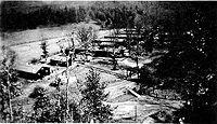 Overhead view of Camp Watoga Barracks in later photo. Note river in background.